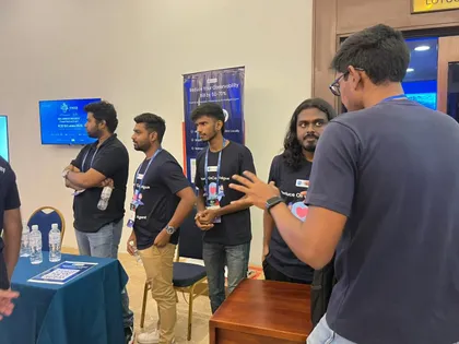 Members of the Randoli team in Randoli T-shirts talking with visitors at the Randoli booth at KCD Sri Lanka 2025